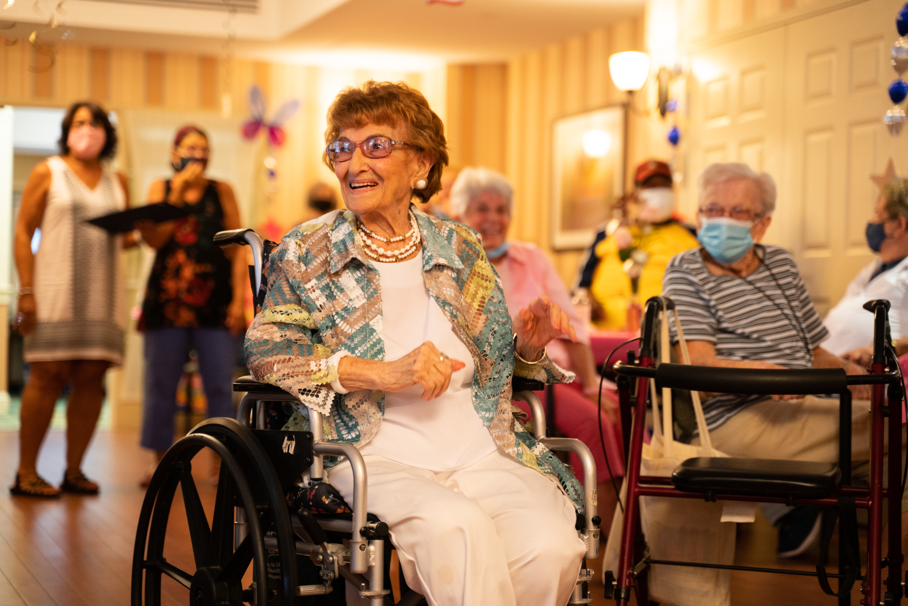 Gloria Ezzie celebrates 100 years with her friends and family at Seashore Housing on Aug. 23.