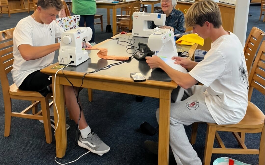 Local stitching club and high school students team up to comfort hospitalized children