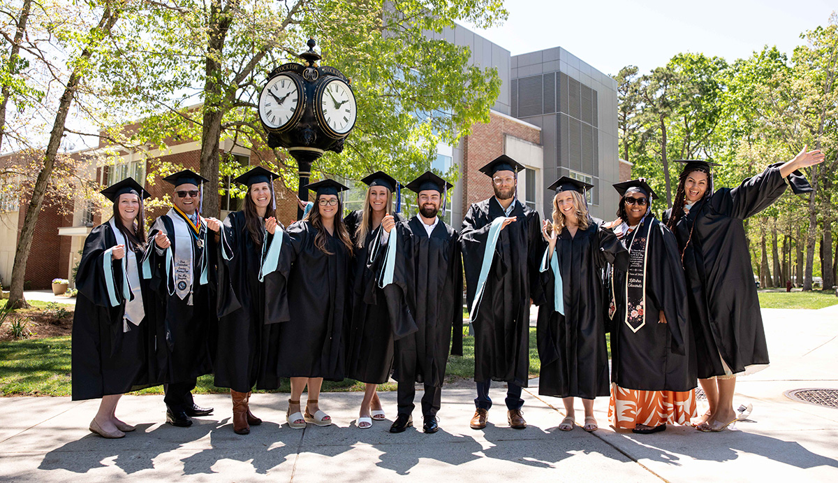 Master’s and doctoral graduates told to lead through service and